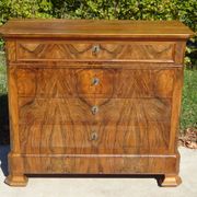 Walnut and walnut burl commode in Louis Philippe style.