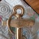 Solid bronze door knocker in the shape of a marine anchor and ropes