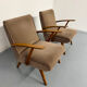 Set of 2 vintage wooden and fabric armchairs designed in the 1960s.