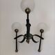 Black and gold lace-up with three arms of vintage 1950 lights