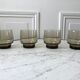 Set of 4 glasses in smoked glass 70s
