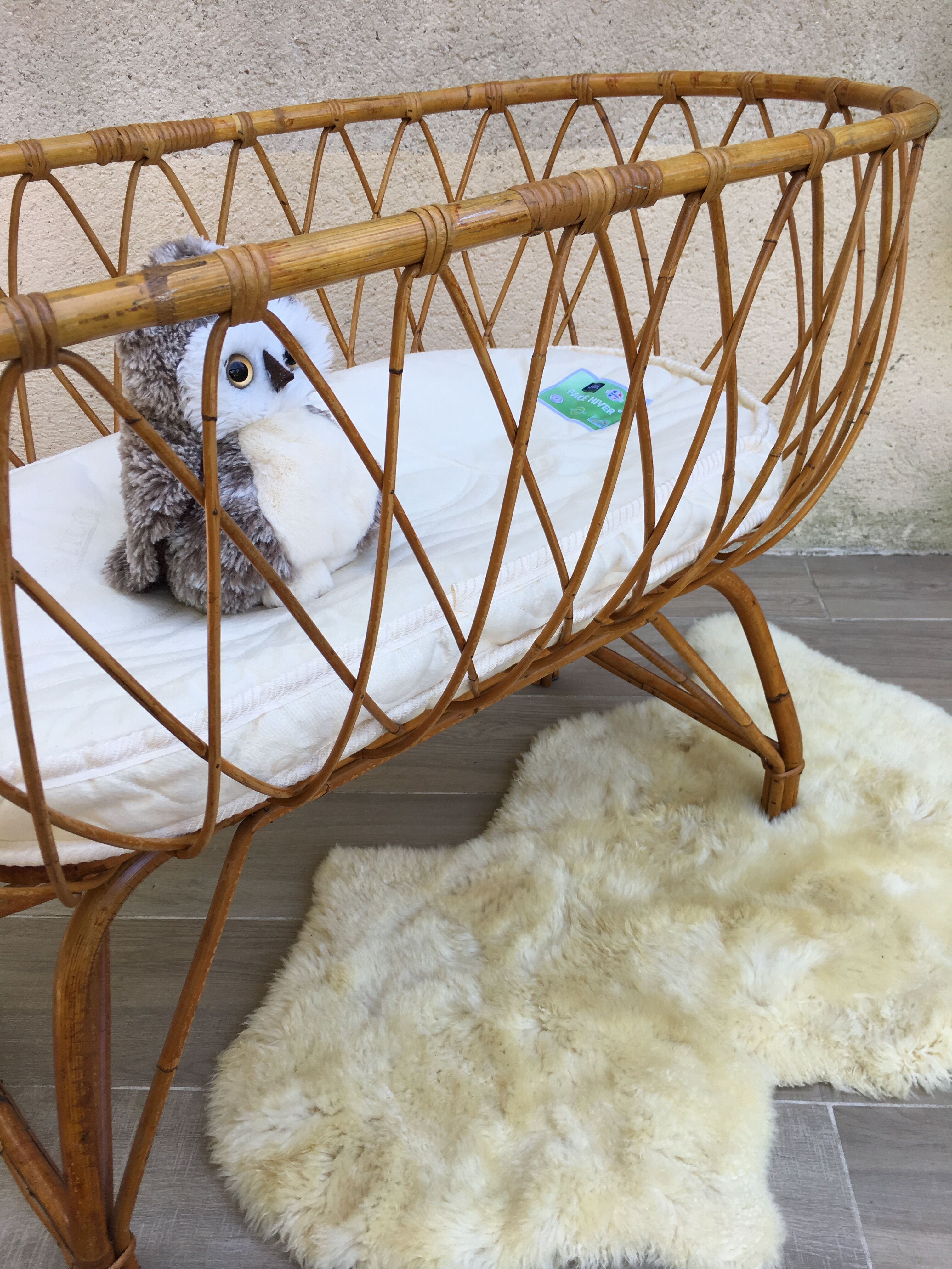 Vintage rattan cradle