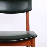 Set of 8 Danish chairs in teak, black leatherette and brass, Sven Chrobat/Sax.
