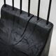 Brutalist chair, black-stained raw wood, steel. Work from the 1970s