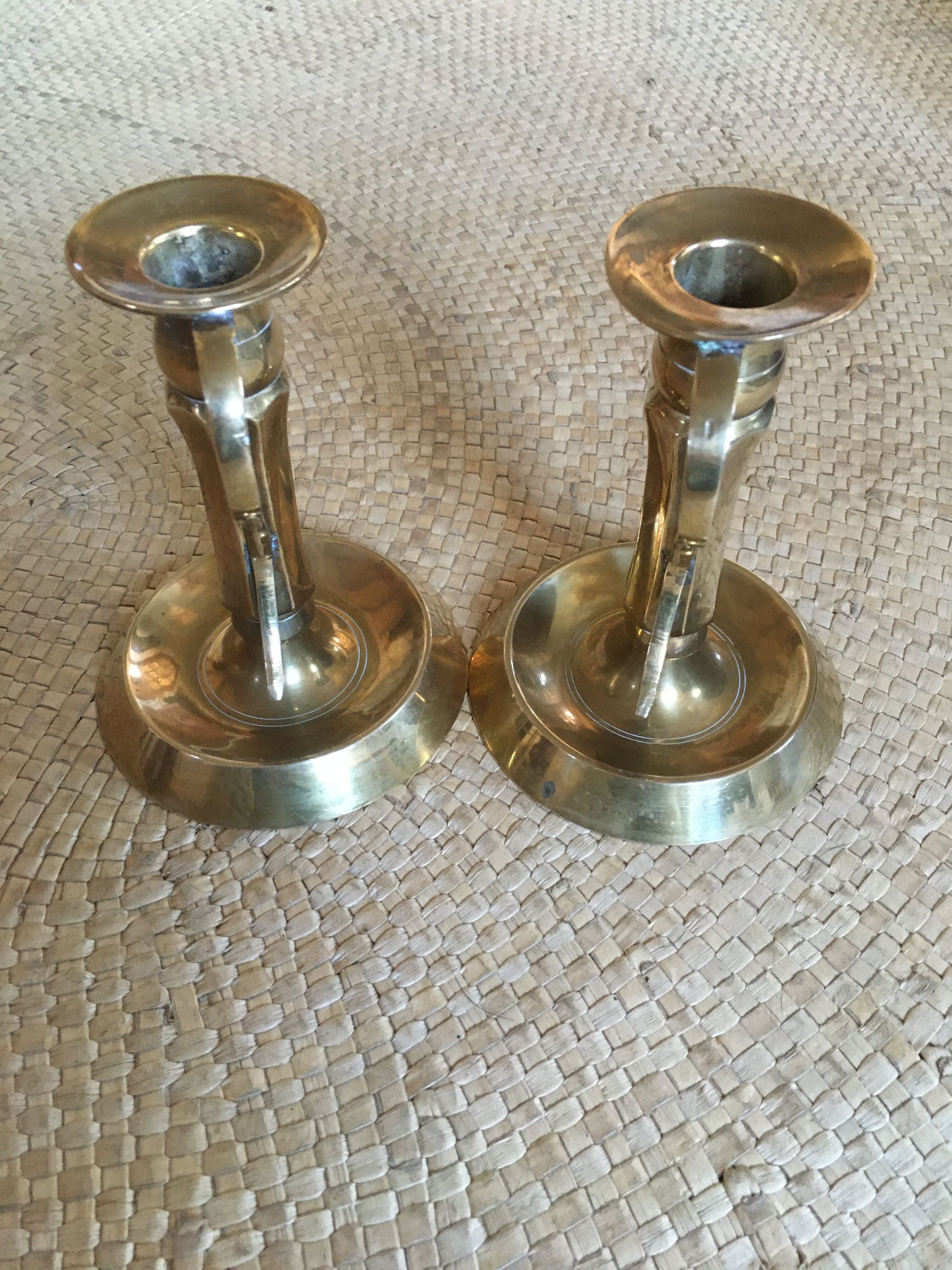 Duo of brass candlesticks
