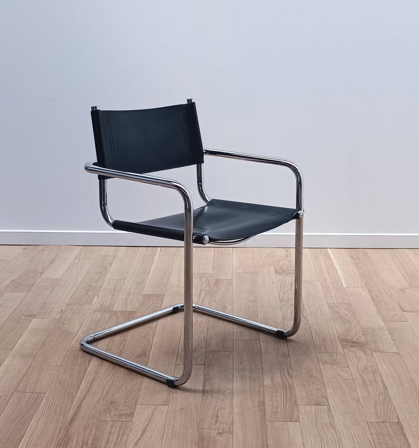 Suite of 12 designer armchairs