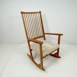 Mid-century rocking chair in pine and sheepskin by Yngve Ekström, Sweden.