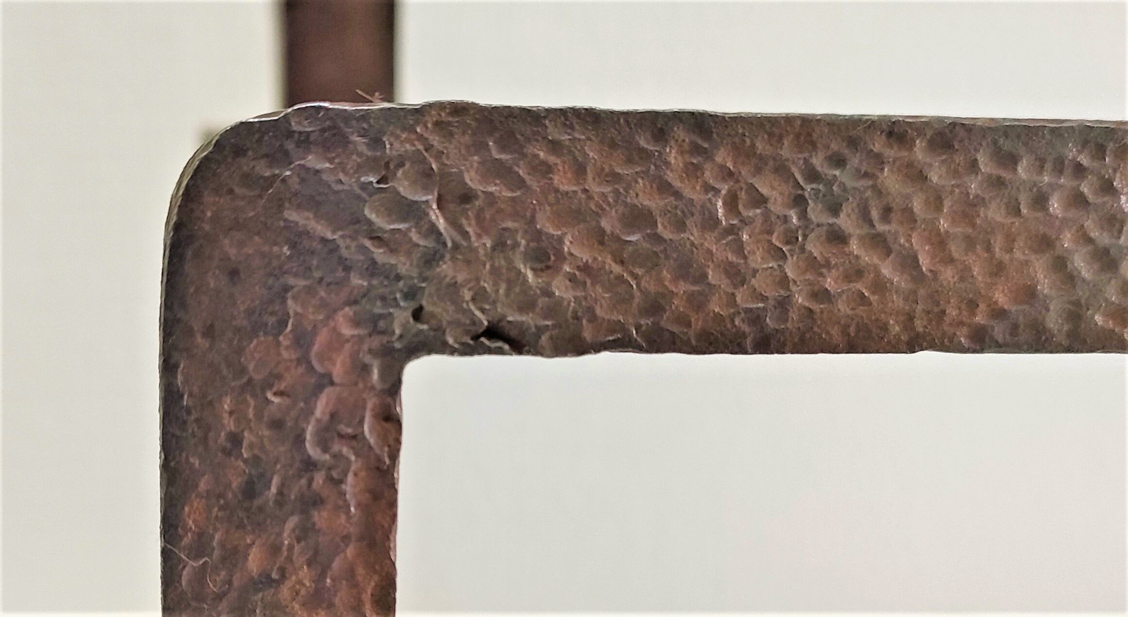 Pair of sculptural cast iron chenets with twisted heads