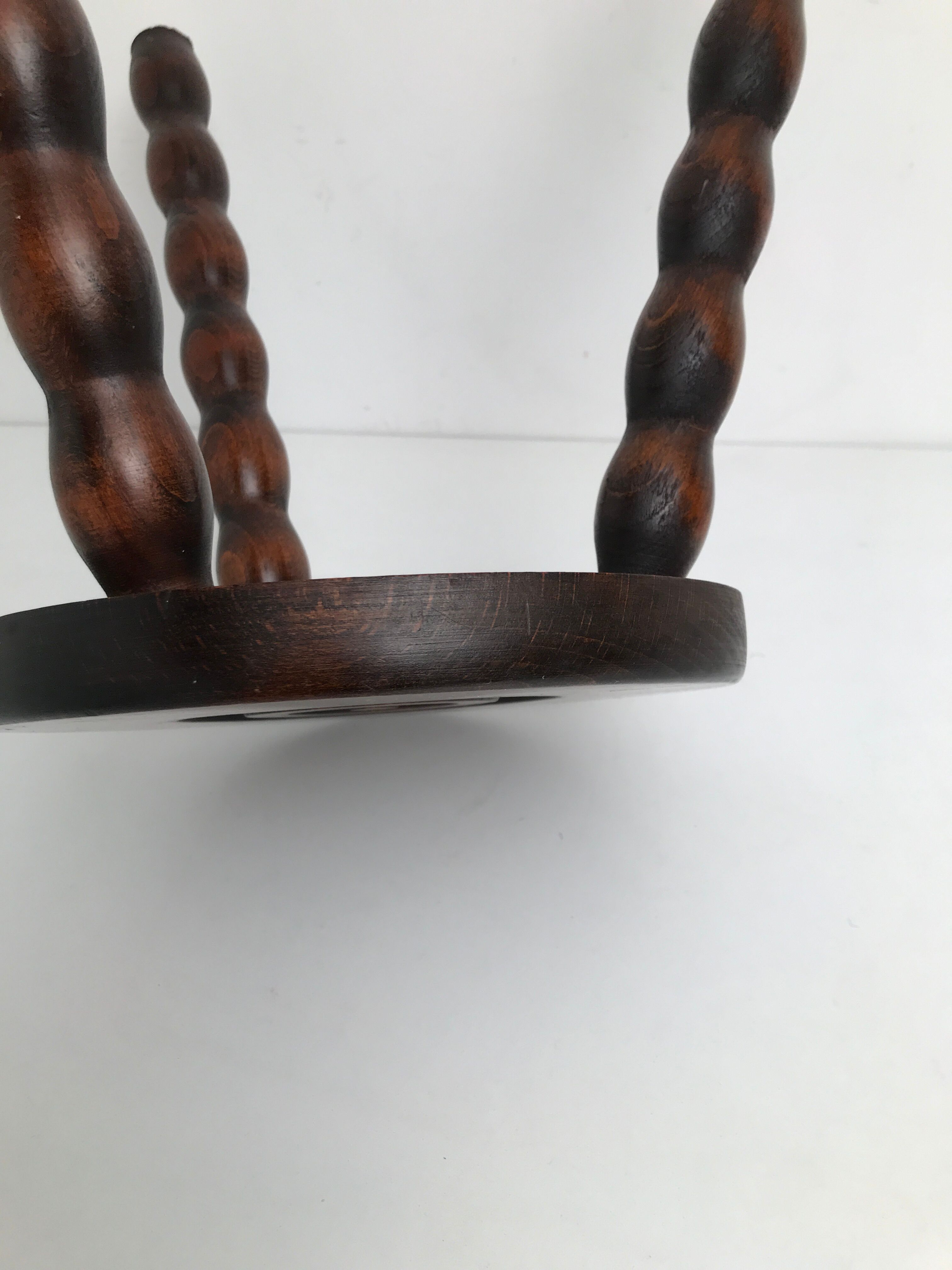 Wooden stool turned tripod foot