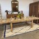 Solid oak extendable farmhouse table with 2 drawers.
