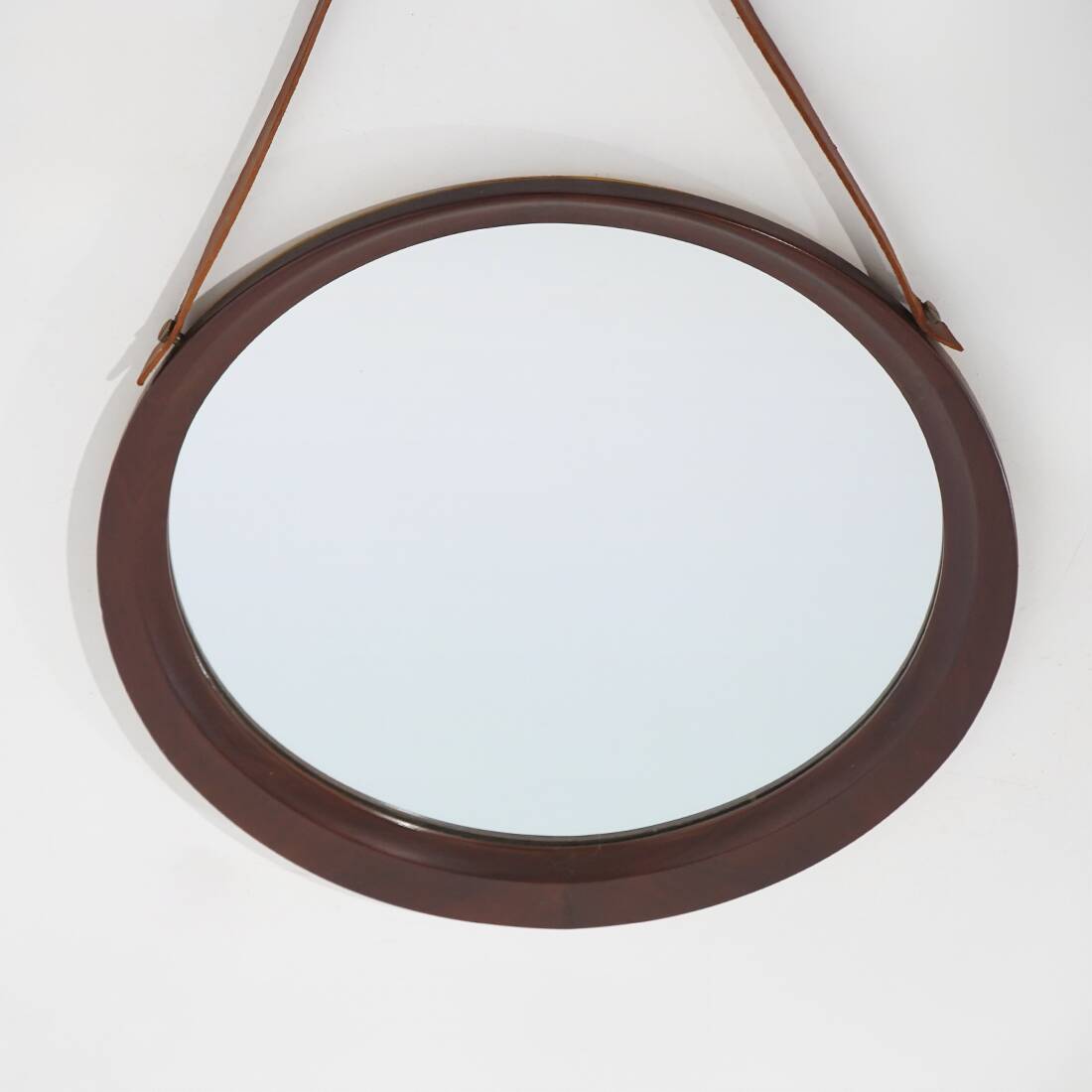 Round wall mirror with leather strap, 1960s