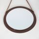 Round wall mirror with leather strap, 1960s