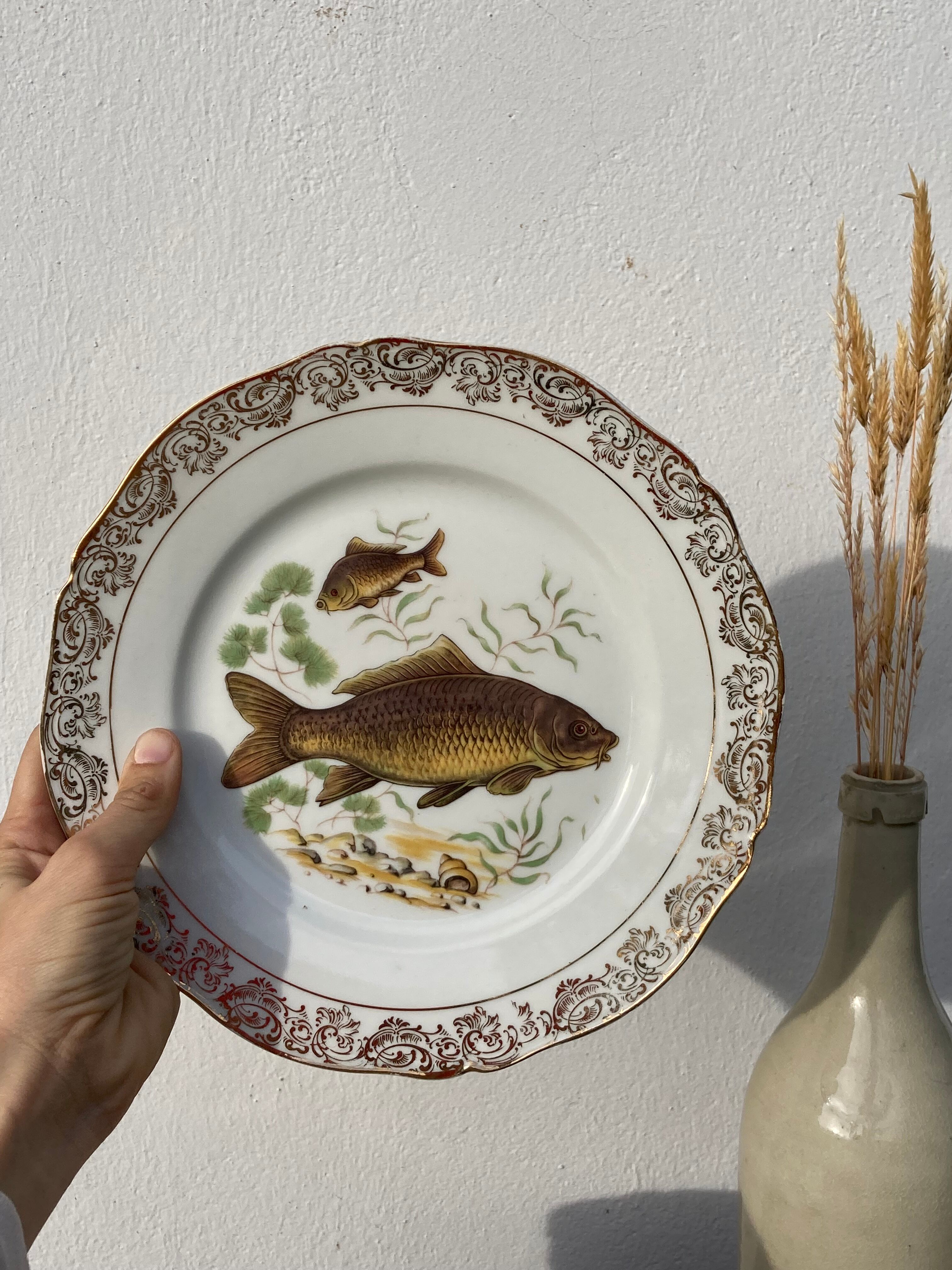 11 vintage Limoges porcelain fish plates