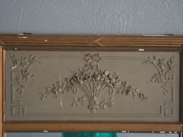 Louis XVI style in Golden stucco trumeau