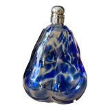 Old blue speckled bottle