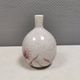 A vase in crackled porcelain with pink decoration. Germany 1930s