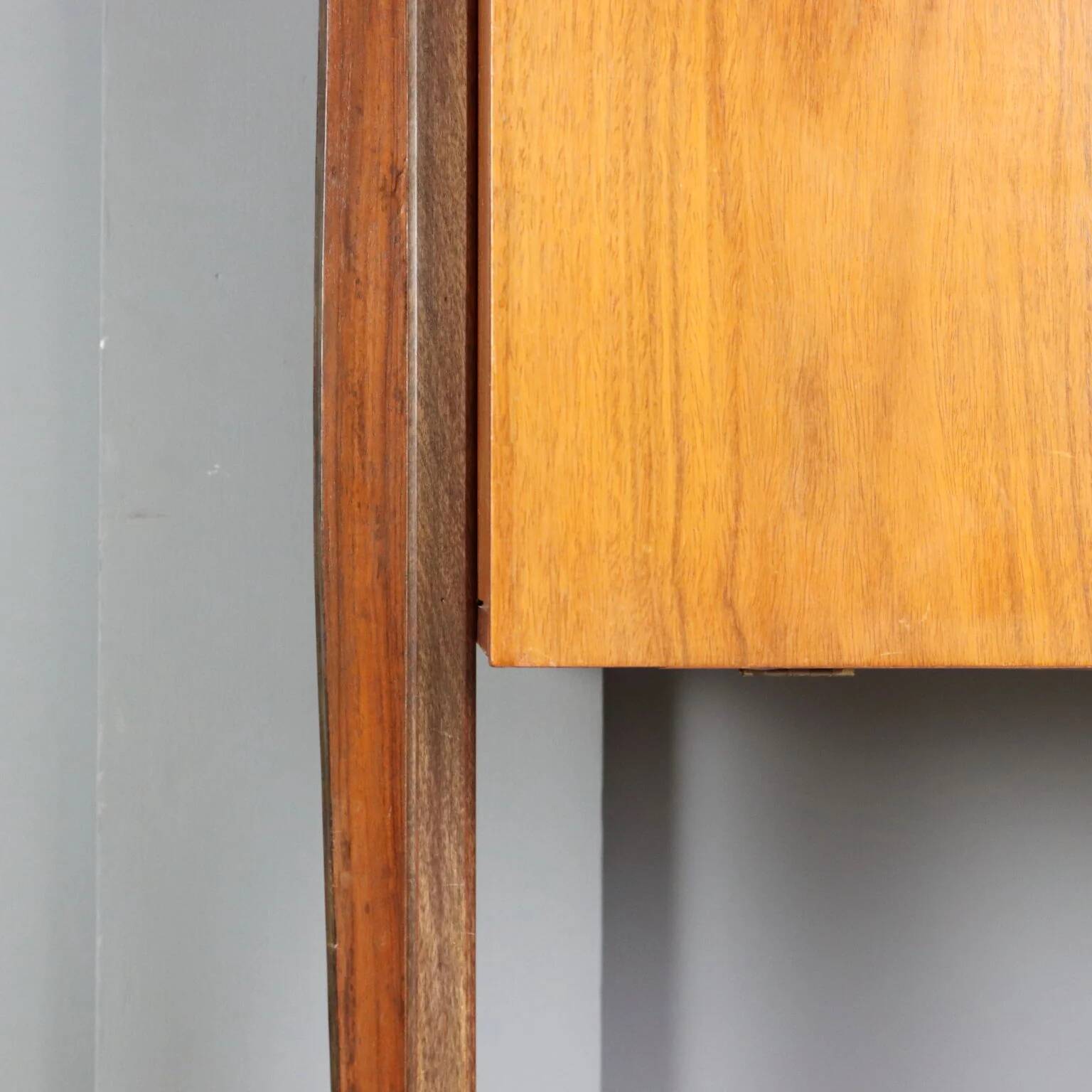 Vintage library from the 1950s-60s with a bar compartment.
