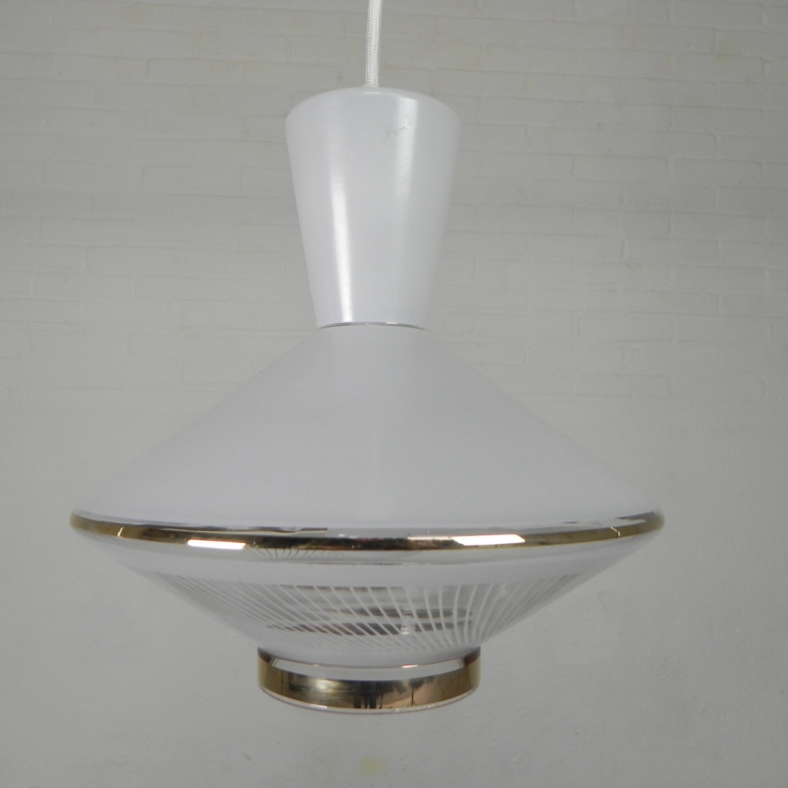 UFO-shaped pendant lamp with white glass on top and clear glass with white