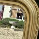 Miroir de style Louis Philippe en bois doré
