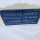 Plaque publicitaire en faïence