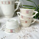 Vintage tea set in white porcelain with stripes, Moulin des Loups orcerame model "Richelieu"