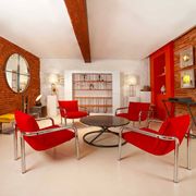 Pair of Italian armchairs in chromed metal and red fabric, 1970