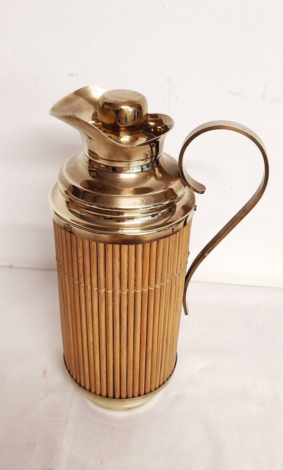 Brass and wood thermos. Spain, 1960s.