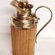 Brass and wood thermos. Spain, 1960s.
