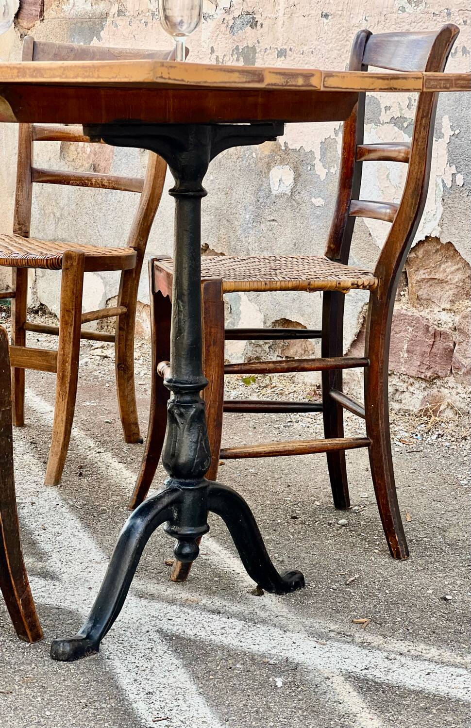 Antique bistro table with cast iron legs