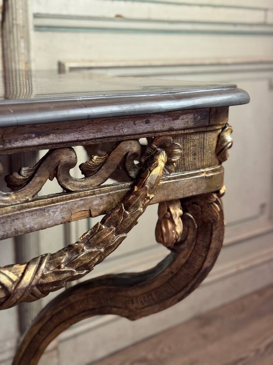 Transitional console in carved and gilded wood, France, 18th century