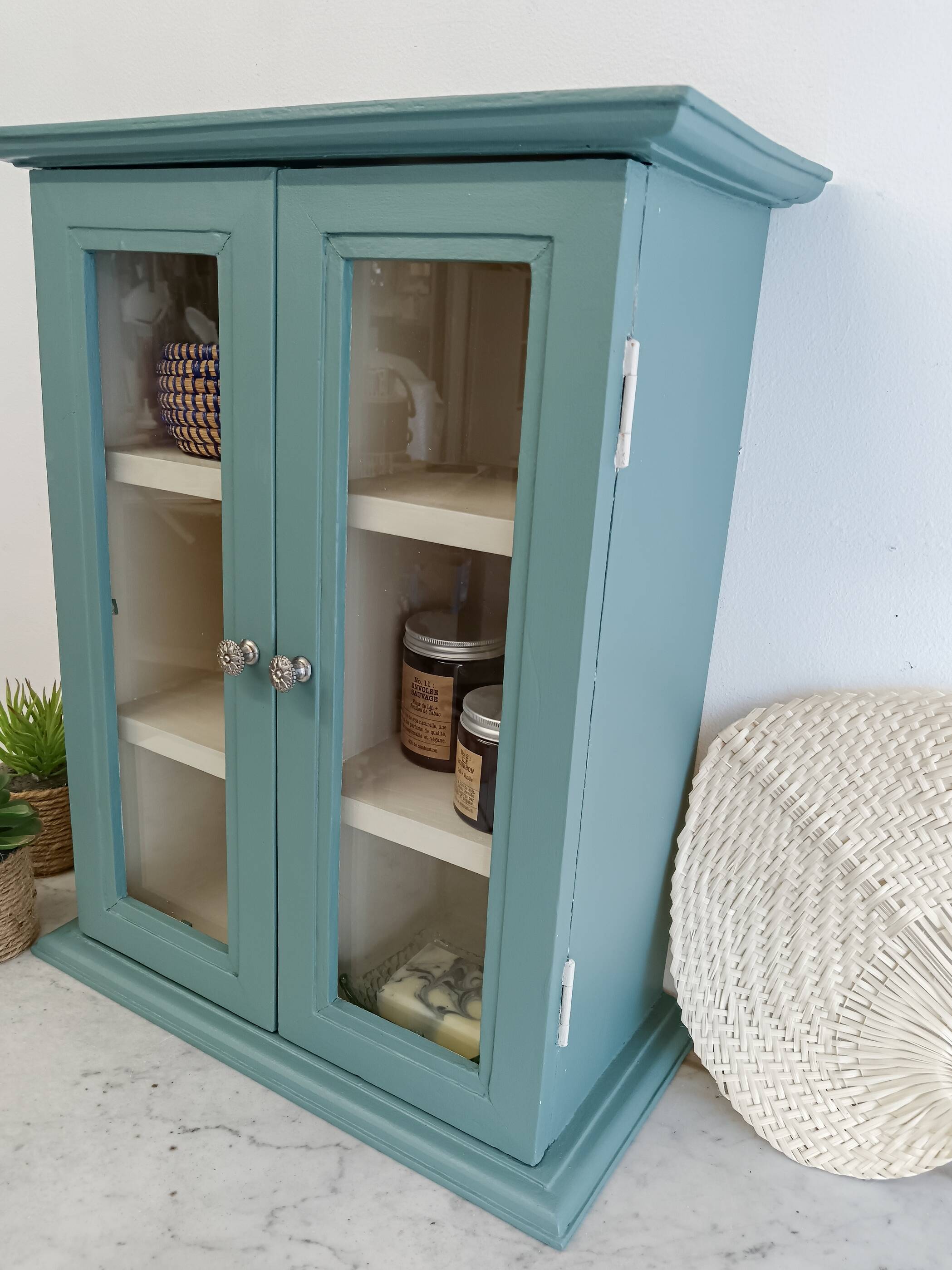 Green and beige 2-door wall display case