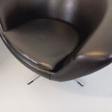 Pair of vintage Scandinavian swivel armchairs in faux leather and chrome.