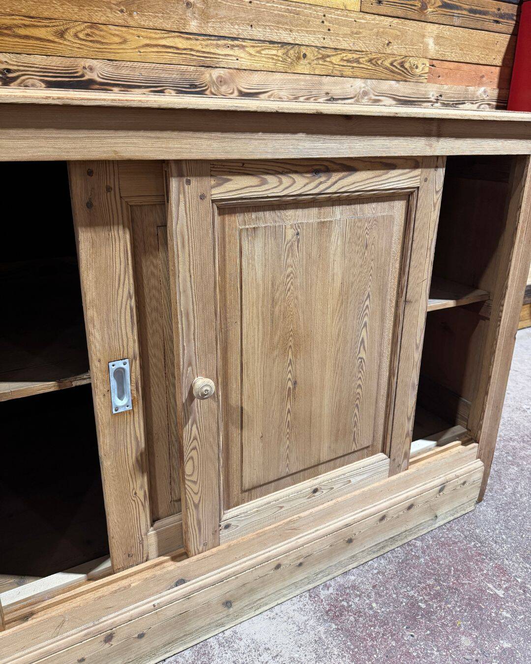 Old haberdashery counter in pitch pine