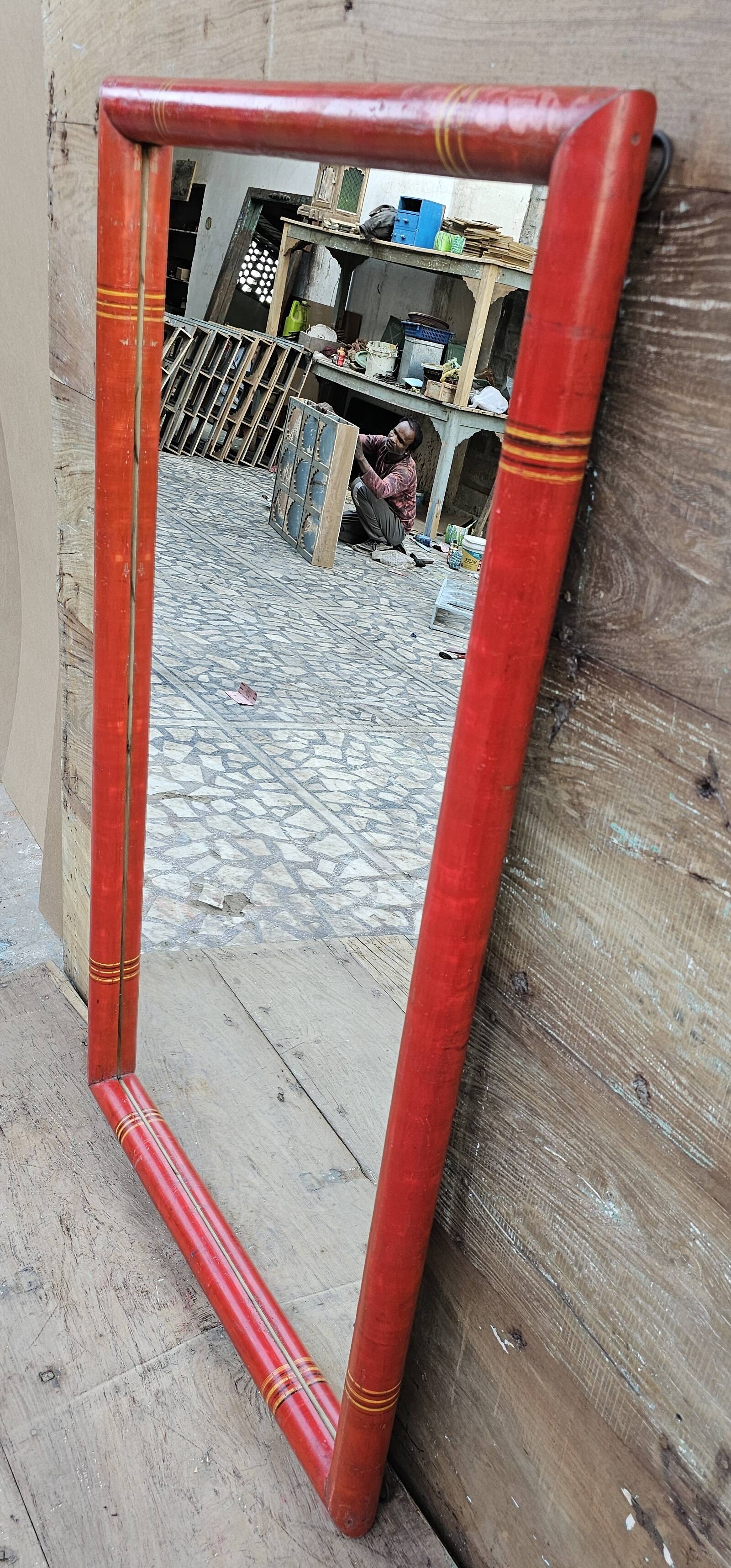 Antique mirror in Burmese teak.