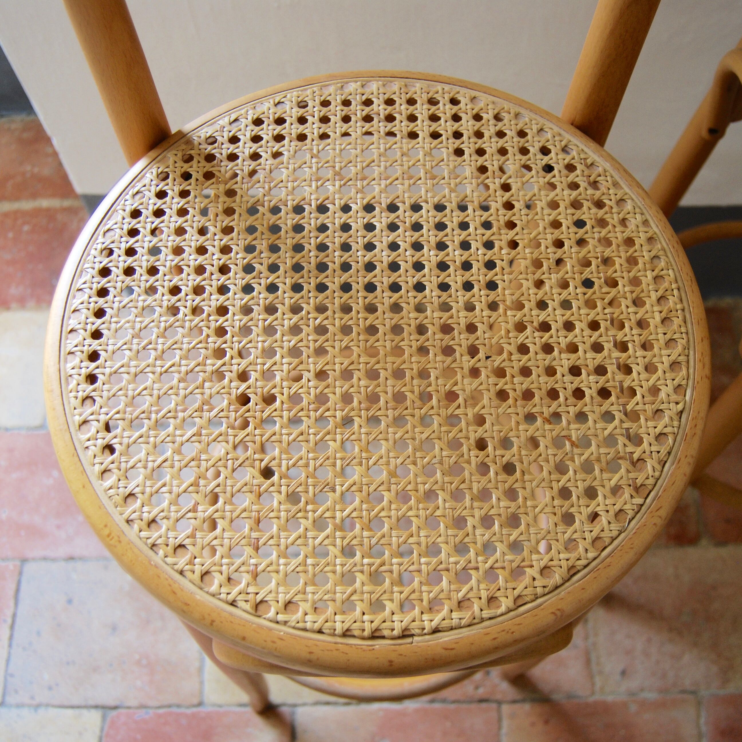 Wooden bar stools and cane