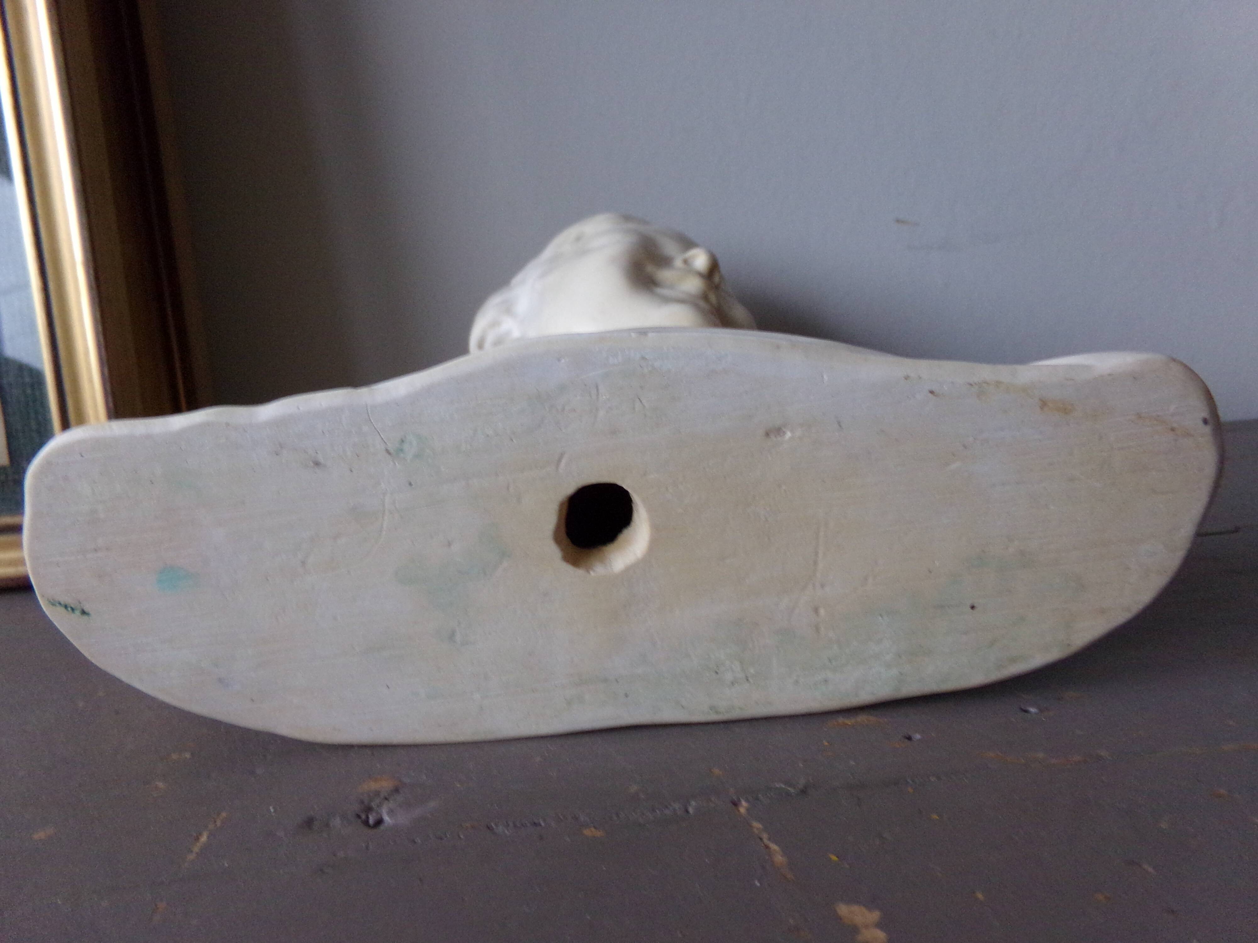 Bust of the laughing child