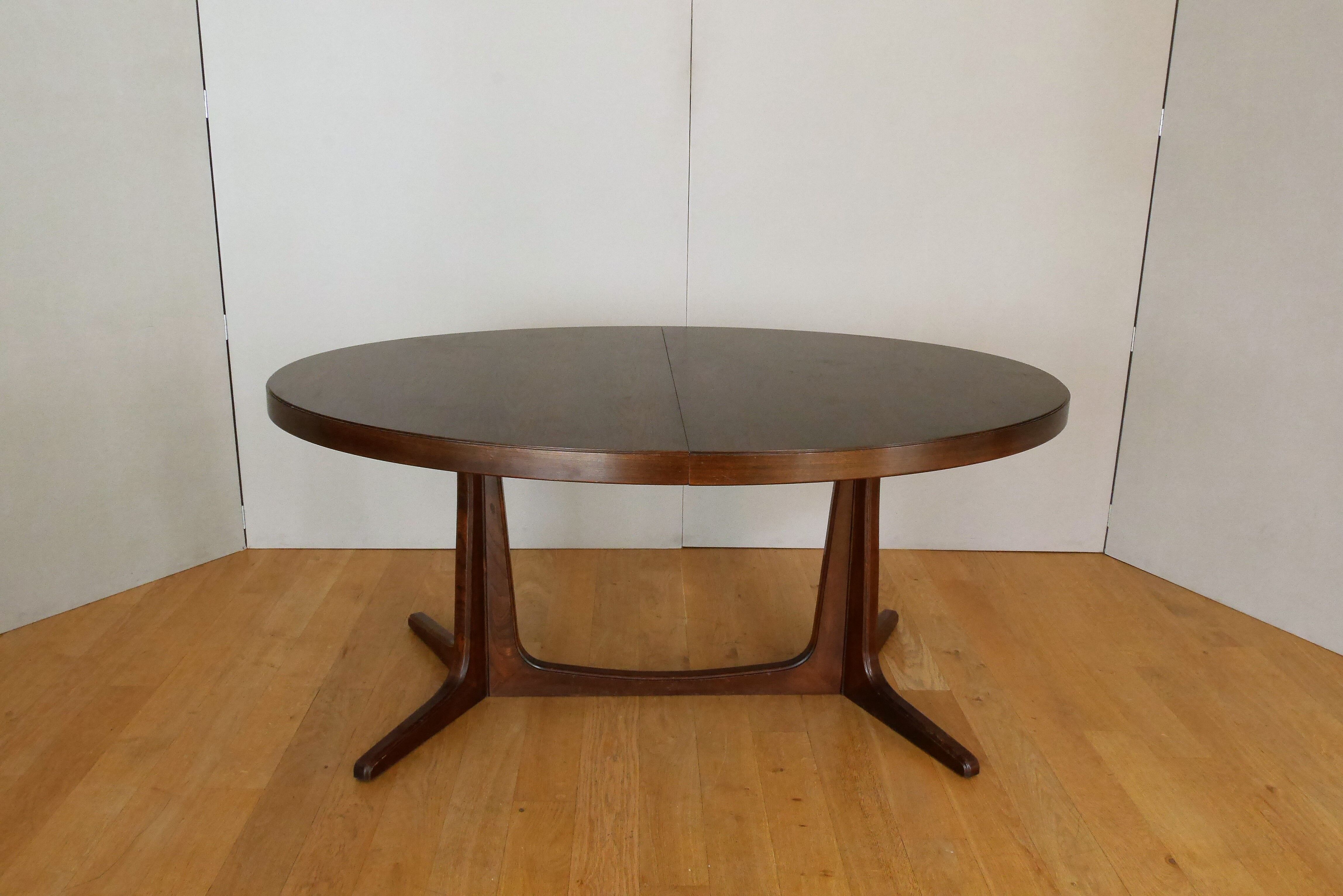 Extendable oval elm table with Baumann extensions