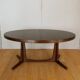 Extendable oval elm table with Baumann extensions