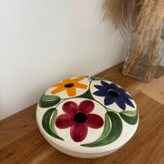 Charming vintage ceramic flower vase with floral decoration from the 1970s.