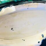 Old garden center in navy blue slurry