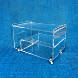Translucent plexiglass storage drawer/cabinet on wheels.