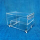 Translucent plexiglass storage drawer/cabinet on wheels.