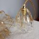 Pair of draped blown glass hanging lamps, ocher twisted wire