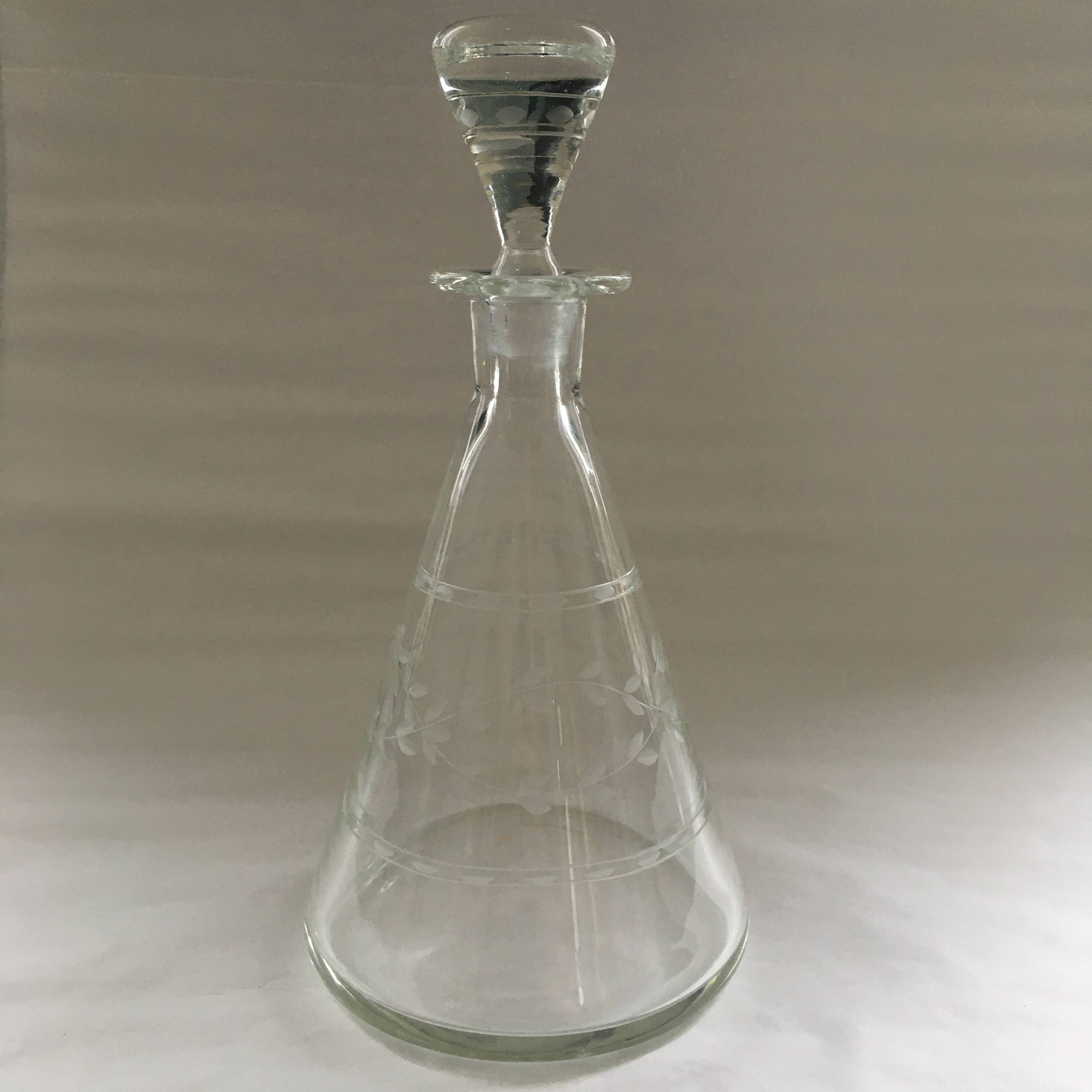 Carafe with chiseled floral decoration