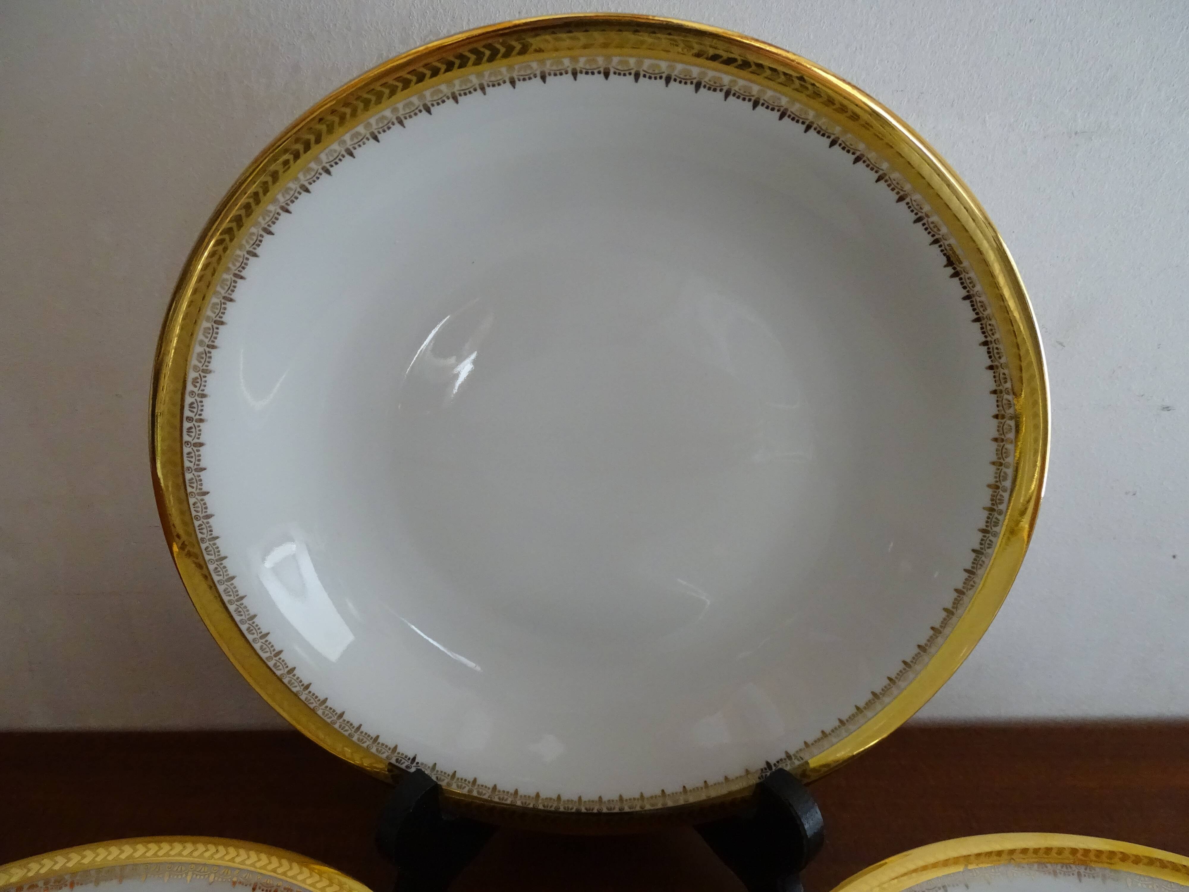 12 hollow plates porcelain of Sologne Larchevèque white and golden signed