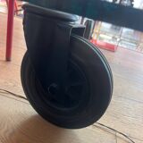 Gae Aulenti coffee table for Fontana Arte, transparent glass top with black cast iron supports, 1980s.