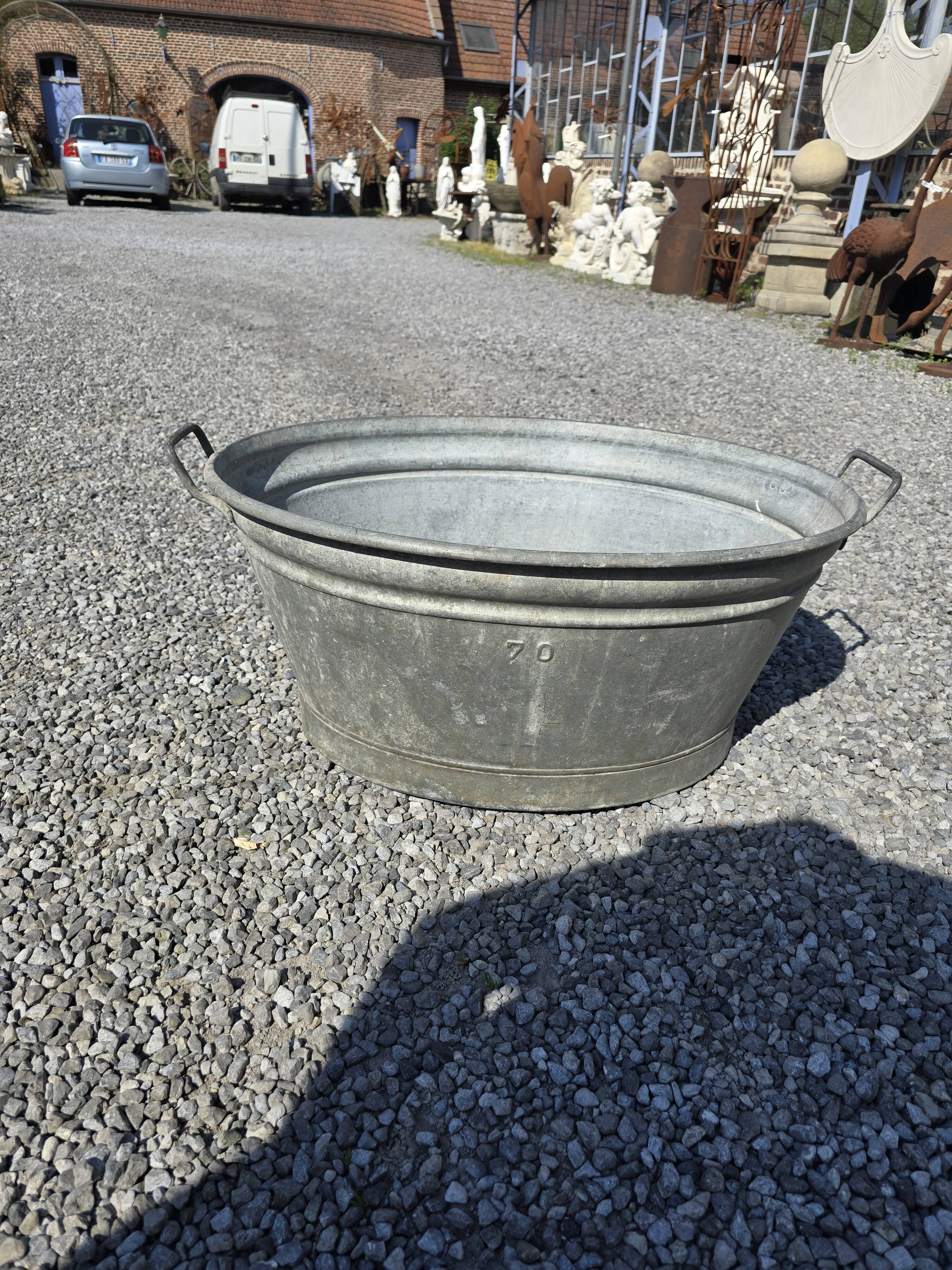 Old zinc basin or bathtub, 70 liters