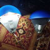 a pair of Ikea Kvintett wall lamps