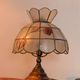 Vintage lamp in wood, brass and mother-of-pearl.
