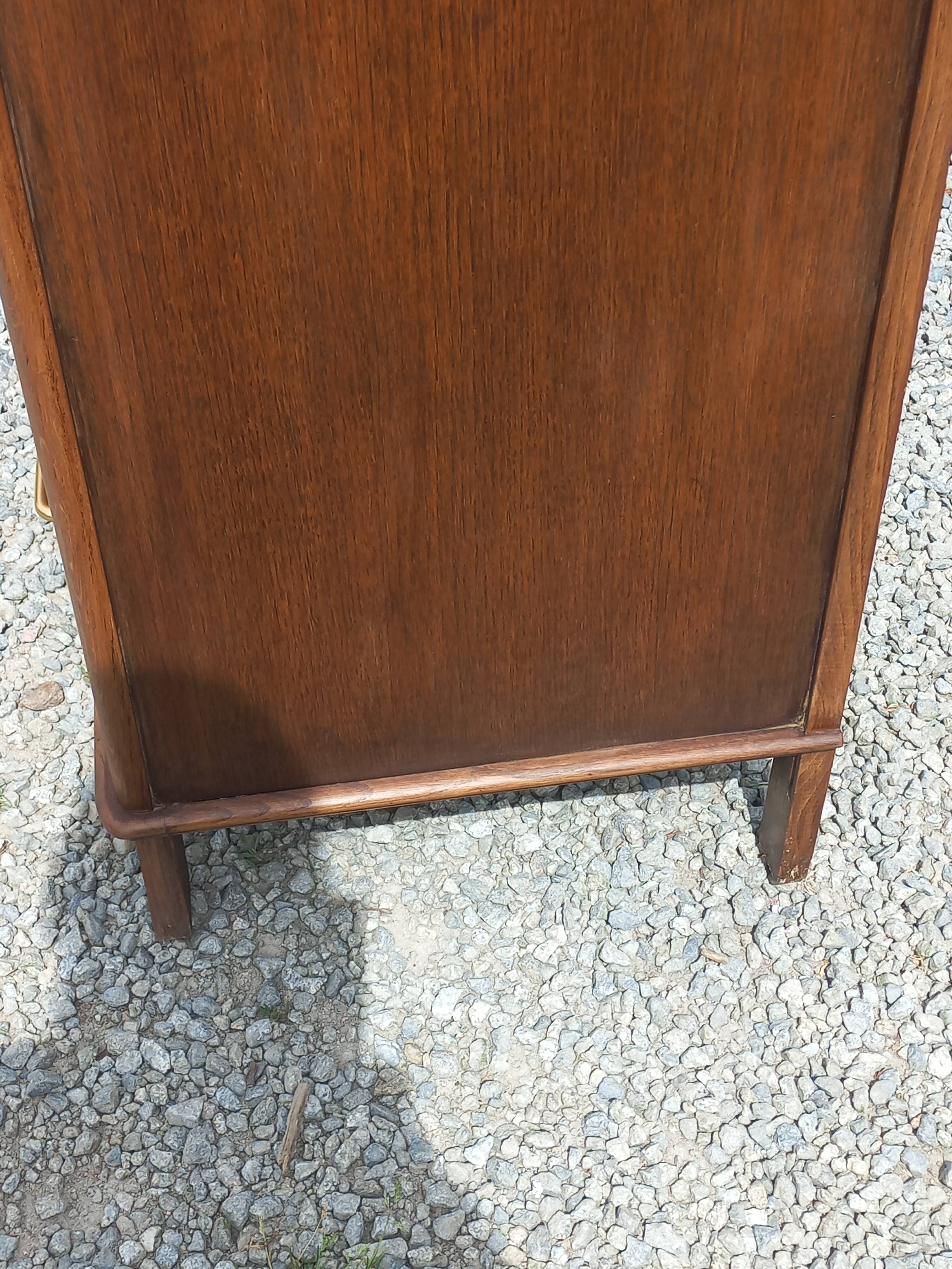 Vintage oak commode with tapered legs from the 1950s.